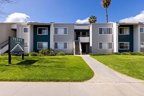 Ramona apartment for rent - Apartment complex with a sign that says