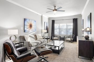 San Antonio apartment for rent - A living room with a chair and a couch.