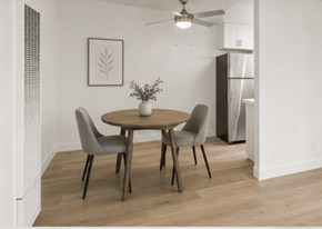 El Cajon apartment for rent - A dining room with a round table and four grey chairs.