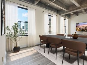 Los Angeles apartment for rent - A dining room with a brown table and chairs.