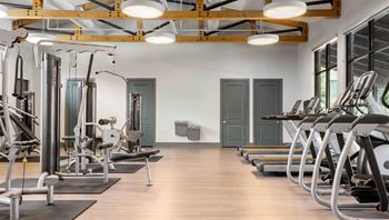 24-Hour fitness center equipped for cardio & strength training