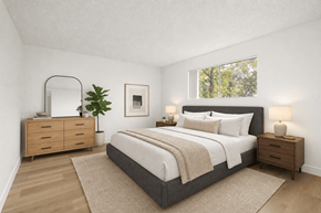 El Cajon apartment for rent - A bedroom with a large bed, a dresser, and a mirror.