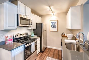 Wood-style flooring in select apartment homes