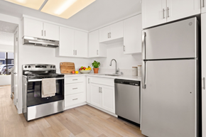 El Cajon apartment for rent - A modern kitchen with a stainless steel refrigerator and oven.
