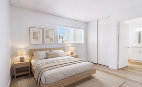 Ramona apartment for rent - A bedroom with a large bed and two nightstands.