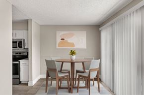 Mesa apartment for rent - A dining room with a table and chairs.