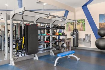Fitness center featuring trx equipment