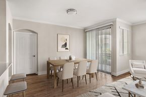 Peoria apartment for rent - A dining room with a table set for six.