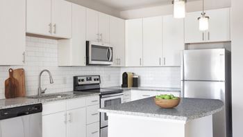 White subway-tile kitchen backsplash
