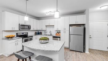Kitchen island w/ pendant lighting