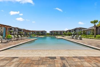 Beach-entry saltwater swimming pool w/ sun deck