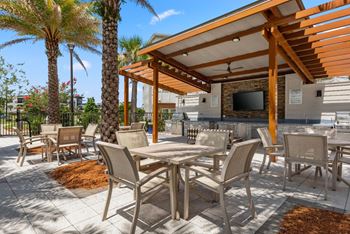 Shaded pool pavilion w/ summer kitchen