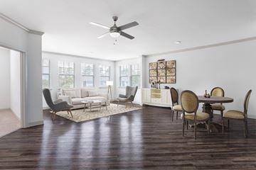 Savannah apartment for rent - A living room with a dining table and chairs.