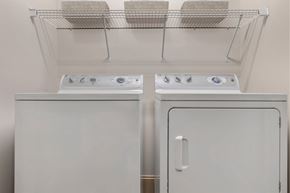 Charlotte apartment for rent - Two white ovens are in a kitchen.
