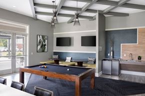 Charlotte apartment for rent - A room with a pool table and a television.