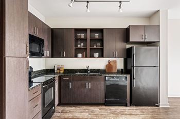 Modern cabinetry w/ brushed-nickel finishes