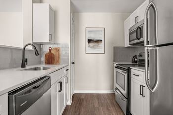 Gourmet kitchens w/ stainless-steel appliances*