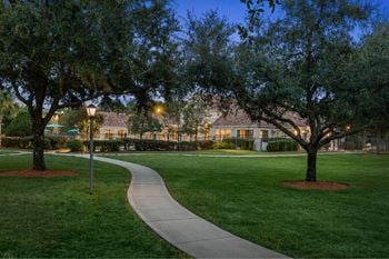 Lush, tropical floridian landscaping w/ courtyard