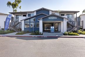 San Ysidro apartment for rent - A leasing office is located in front of a two-story apartment building.