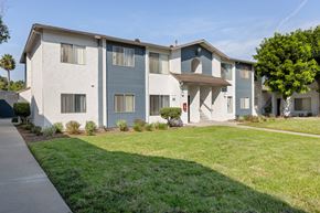 San Ysidro apartment for rent - Apartment building with a green lawn in front.