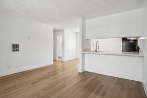 El Cajon apartment for rent - A kitchen area with a counter and a sink.