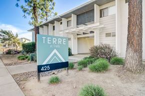 Ramona apartment for rent - A sign in front of a building that says