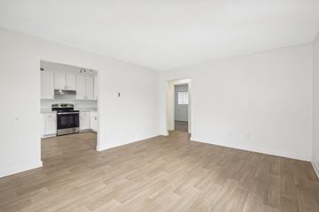 Spring Valley apartment for rent - A kitchen with a stove top oven and a microwave.