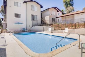 Spring Valley apartment for rent - A small residential pool in front of a house.