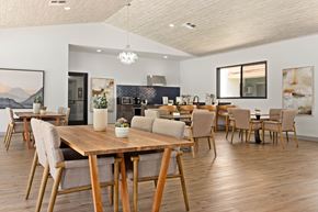 Escondido apartment for rent - A modern dining room with a wooden table and chairs.