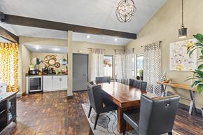 Renton apartment for rent - A dining room with a wooden table and chairs.