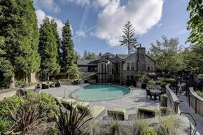 Gresham apartment for rent - A large house with a pool in the backyard.
