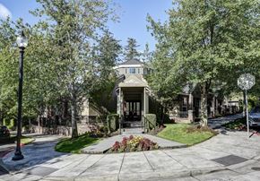 Gresham apartment for rent - A house with a front yard and a street lamp.