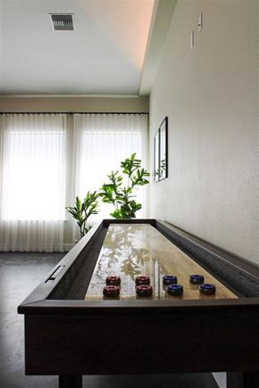 Stockton apartment for rent - A pool table with red balls is in the middle of a room with a plant and picture on the wall.