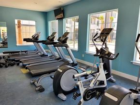 Stockton apartment for rent - A gym with treadmills and elliptical machines.