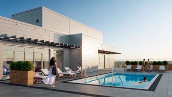 Rooftop pool deck with lounge seating