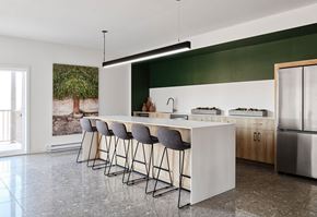 Gatineau apartment for rent - A modern kitchen with a bar area and stools at Champlain Village Urbain Apartments , Gatineau, Quebec
