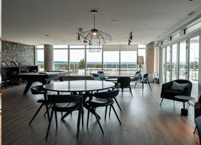 Ottawa apartment for rent - Modern dining room with round table and seating at Baseline Apartments, Ottawa, Ontario