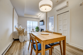 Gatineau apartment for rent - A dining room with a wooden table and chairs at Champlain Village Urbain Apartments , Gatineau, QC