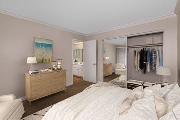 Brea apartment for rent - A bedroom with a large bed and a wardrobe.