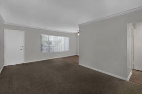 Garden Grove apartment for rent - A room with a carpeted floor and white walls.