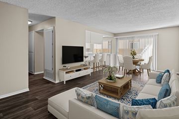 Camarillo apartment for rent - A living room with a white couch and a wooden coffee table.