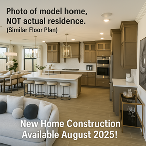 Chandler house for rent - A modern kitchen with a bar area and a living room area with a sofa.