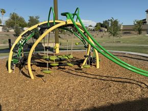 Chandler house for rent - A playground with a green and yellow slide.
