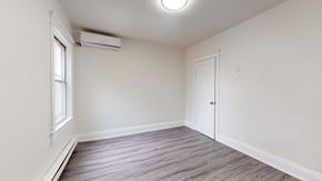 Toronto apartment for rent - A room with a window and a door.