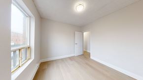 Toronto apartment for rent - A room with a window and a door.