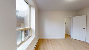 Toronto apartment for rent - A room with a window and a door.