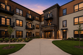 Mahtomedi apartment for rent - The entrance to a building with a sign that reads "The Summit".