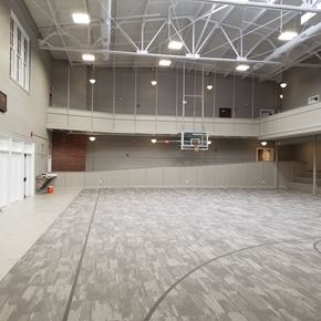 Corydon apartment for rent - an empty gym with a basketball hoop in the middle of the floor