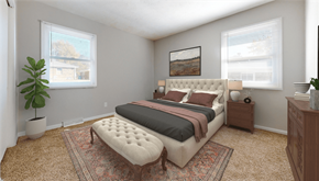 Franklin apartment for rent - A bedroom with a large bed and a rug on the floor at Stonebrook of Franklin Apartments, Franklin, IN, 46131
