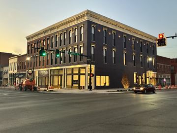 Van Wert apartment for rent - A street view of a building with a green traffic light.